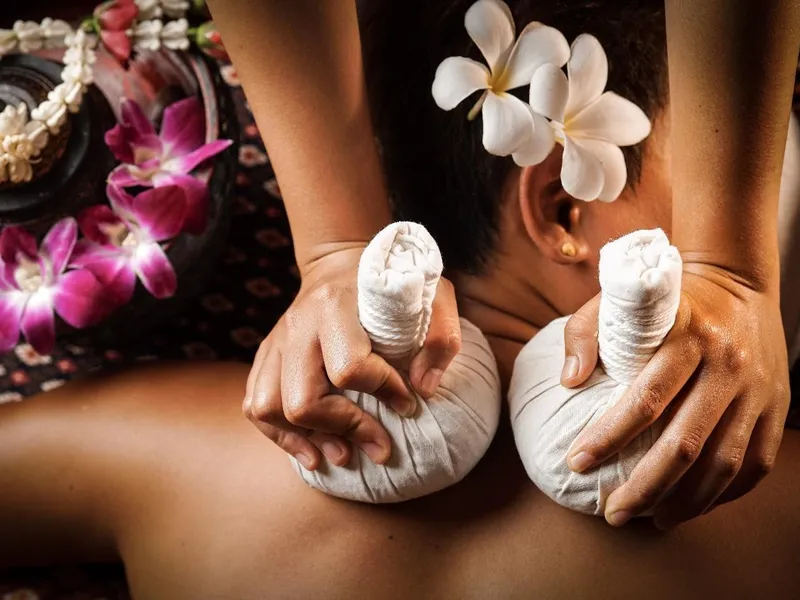 Image of oil being poured onto hand