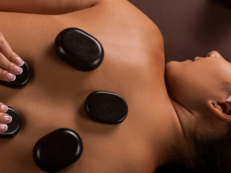 Image of oil being poured onto hand